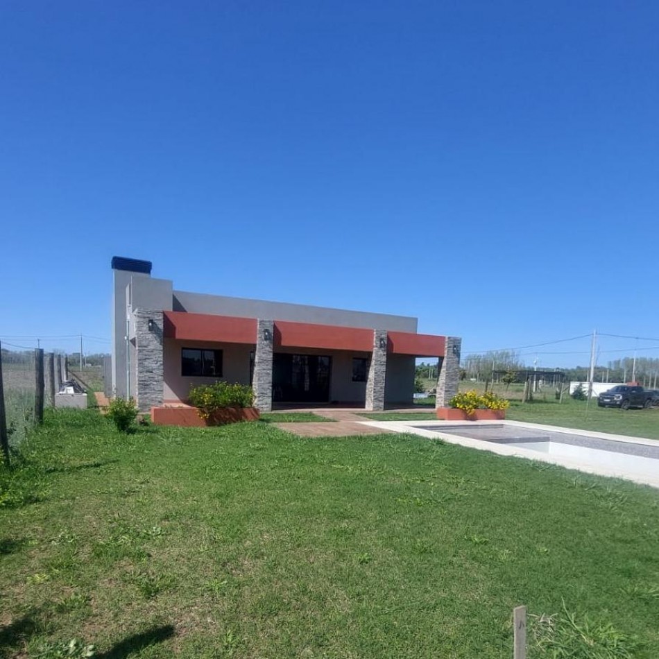 CASA QUINTA EN VENTA SOBRE LOTE AMPLIO